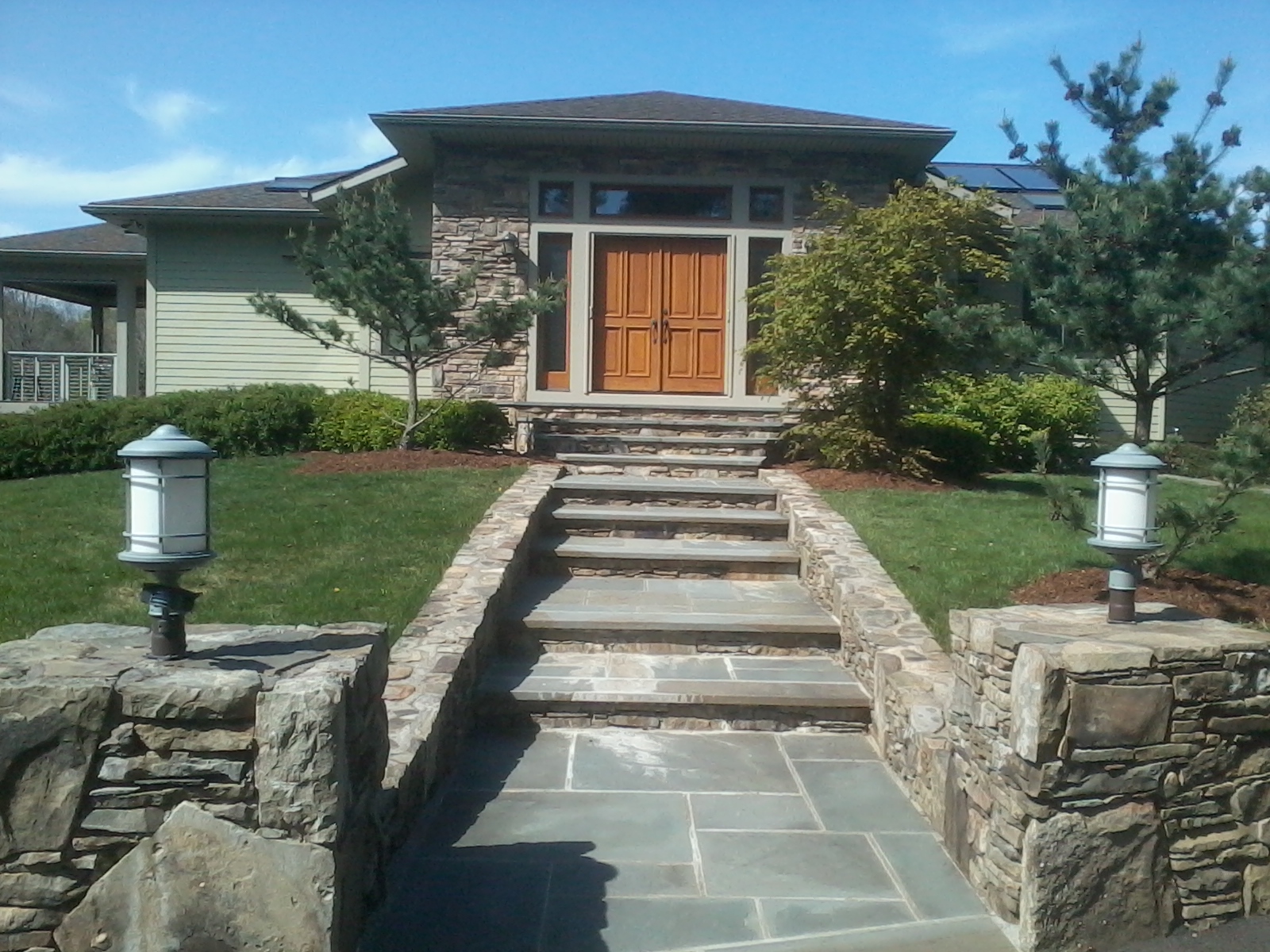Front Yard Landscaping with blue stone located in Catskill
